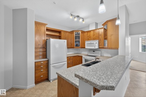 112 2503 Hanna Crescent, Edmonton, AB - Indoor Photo Showing Kitchen With Double Sink