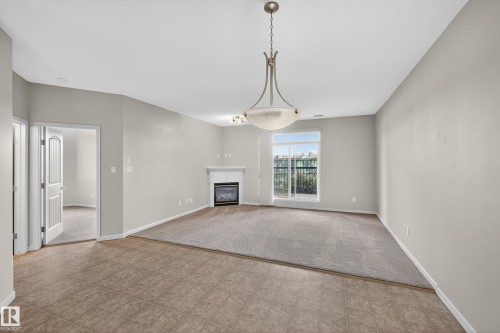 112 2503 Hanna Crescent, Edmonton, AB - Indoor With Fireplace