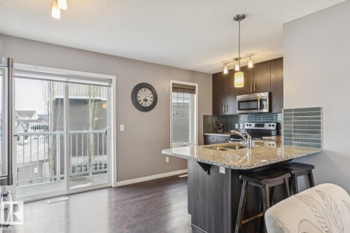 89 4050 Savaryn Drive, Edmonton, AB - Indoor Photo Showing Kitchen With Double Sink With Upgraded Kitchen