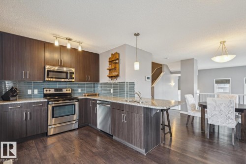 89 4050 Savaryn Drive, Edmonton, AB - Indoor Photo Showing Kitchen With Double Sink With Upgraded Kitchen