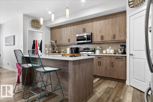 290 Rolston Wynd, Leduc, AB - Indoor Photo Showing Kitchen With Upgraded Kitchen