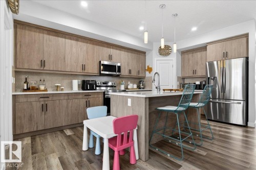 290 Rolston Wynd, Leduc, AB - Indoor Photo Showing Kitchen With Upgraded Kitchen