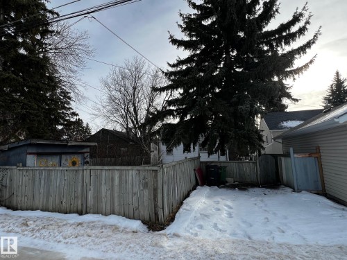 View of yard layered in snow - 10830 68 Avenue, Edmonton, AB - Outdoor