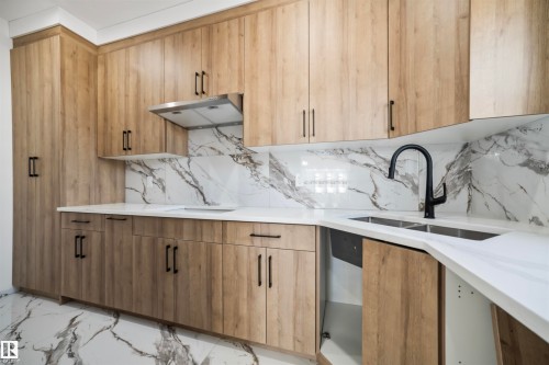 6025 19 Street, Rural Leduc County, AB - Indoor Photo Showing Kitchen With Double Sink