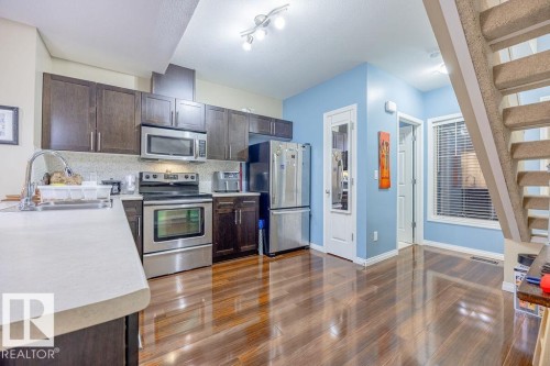 66 1623 Towne Centre Boulevard, Edmonton, AB - Indoor Photo Showing Kitchen With Stainless Steel Kitchen With Double Sink