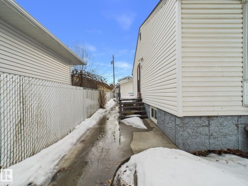 View of snowy exterior - 13523 124B Avenue, Edmonton, AB - Outdoor With Exterior