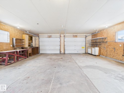View of garage - 13523 124B Avenue, Edmonton, AB - Indoor Photo Showing Garage