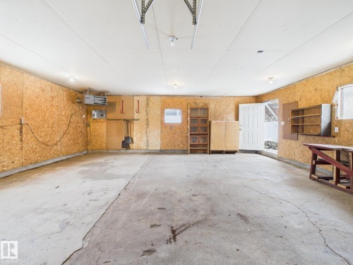 Garage featuring a heating unit - 13523 124B Avenue, Edmonton, AB - Indoor