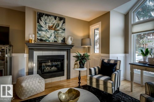 9743 91 Street, Edmonton, AB - Indoor Photo Showing Living Room With Fireplace