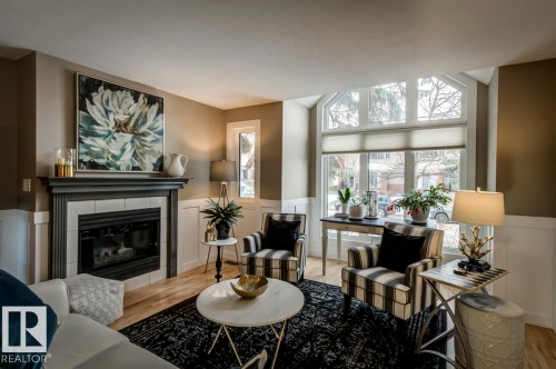 9743 91 Street, Edmonton, AB - Indoor Photo Showing Living Room With Fireplace