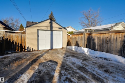Detached garage featuring driveway - 10911 66 Avenue, Edmonton, AB - Outdoor