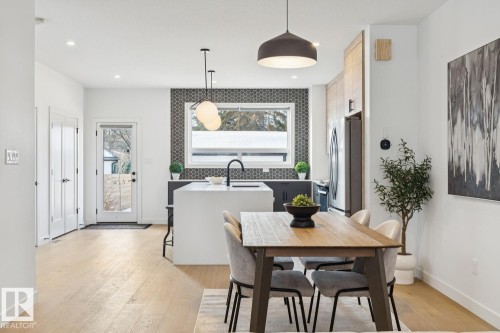 Dining space featuring light wood-style flooring and recessed lighting - 11016 132 Street, Edmonton, AB - Indoor Photo Showing Dining Room