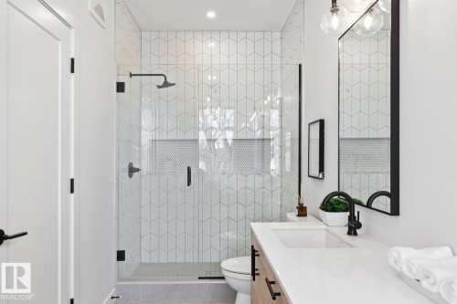 Bathroom featuring vanity, a shower stall, and recessed lighting - 11016 132 Street, Edmonton, AB - Indoor Photo Showing Bathroom
