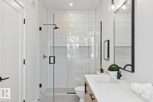 Bathroom with vanity and a stall shower - 11016 132 Street, Edmonton, AB - Indoor Photo Showing Bathroom
