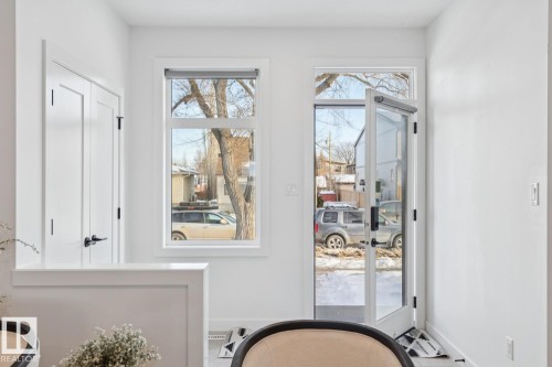 Doorway to outside featuring baseboards - 11016 132 Street, Edmonton, AB - Indoor