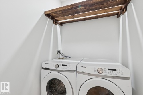 Laundry room featuring independent washer and dryer - 11016 132 Street, Edmonton, AB - Indoor Photo Showing Laundry Room