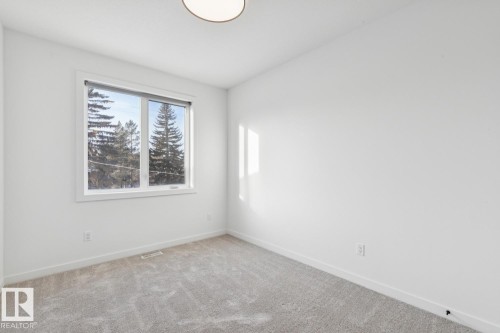 Spare room with carpet and baseboards - 11016 132 Street, Edmonton, AB - Indoor Photo Showing Other Room