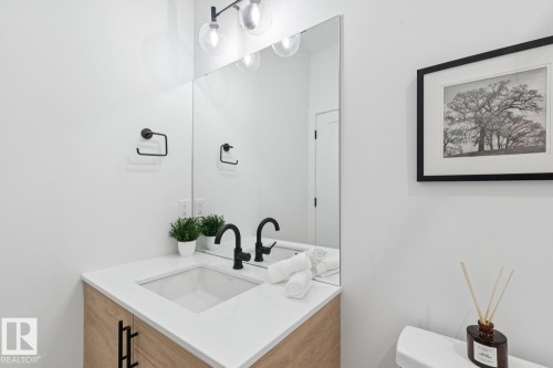 Bathroom featuring vanity and toilet - 11016 132 Street, Edmonton, AB - Indoor Photo Showing Bathroom