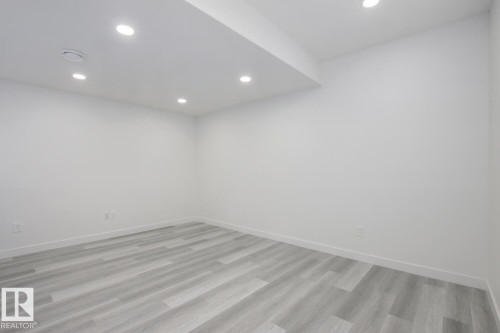 Empty room featuring recessed lighting and light wood finished floors - 11016 132 Street, Edmonton, AB - Indoor Photo Showing Other Room