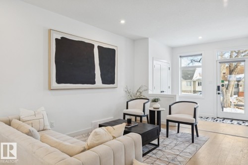 Sitting room featuring wood-type flooring and recessed lighting - 11016 132 Street, Edmonton, AB - Indoor Photo Showing Other Room