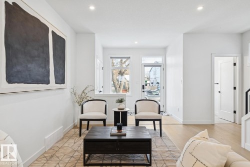 Living area featuring recessed lighting and light wood finished floors - 11016 132 Street, Edmonton, AB - Indoor Photo Showing Living Room
