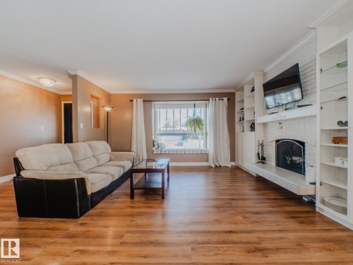 3204 113B Street, Edmonton, AB - Indoor Photo Showing Living Room With Fireplace