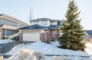 View of front of home with a shingled roof, a garage, and driveway - 3547 Mclay Crescent, Edmonton, AB  - Outdoor 