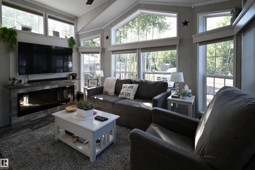64 53206 Rge Road 55 A, Rural Parkland County, AB - Indoor Photo Showing Living Room With Fireplace