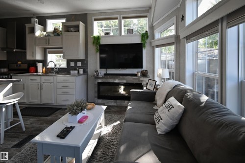 64 53206 Rge Road 55 A, Rural Parkland County, AB - Indoor Photo Showing Living Room With Fireplace