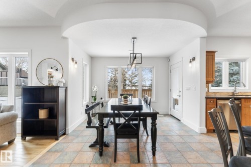 74 Linksview Drive, Spruce Grove, AB - Indoor Photo Showing Dining Room With Fireplace