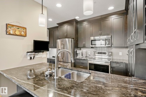 109 11080 Ellerslie Road, Edmonton, AB - Indoor Photo Showing Kitchen With Double Sink With Upgraded Kitchen