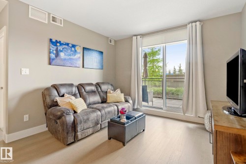 109 11080 Ellerslie Road, Edmonton, AB - Indoor Photo Showing Living Room