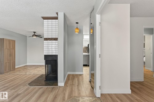 1106 Saddleback Road, Edmonton, AB - Indoor Photo Showing Other Room With Fireplace