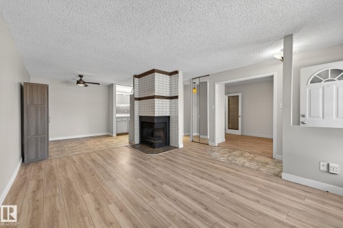 1106 Saddleback Road, Edmonton, AB - Indoor Photo Showing Living Room With Fireplace