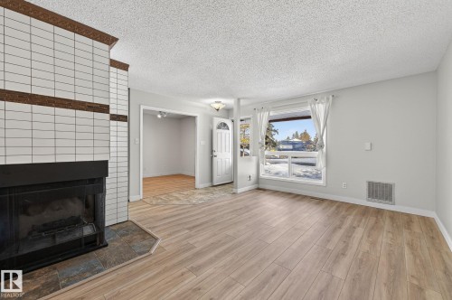 1106 Saddleback Road, Edmonton, AB - Indoor Photo Showing Living Room With Fireplace