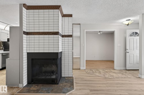 1106 Saddleback Road, Edmonton, AB - Indoor Photo Showing Living Room With Fireplace