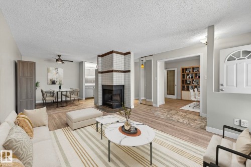 1106 Saddleback Road, Edmonton, AB - Indoor Photo Showing Living Room With Fireplace