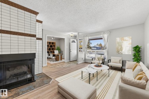 1106 Saddleback Road, Edmonton, AB - Indoor Photo Showing Living Room With Fireplace