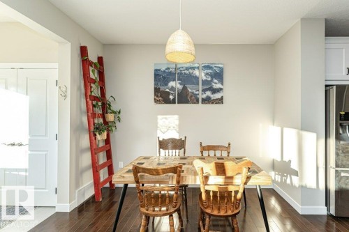 Dining room featuring dark wood-style flooring - 10535 67 Avenue, Edmonton, AB - Indoor Photo Showing Dining Room