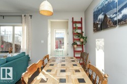 Dining room featuring plenty of natural light and a textured ceiling - 