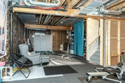 Unfinished basement featuring stairway - 