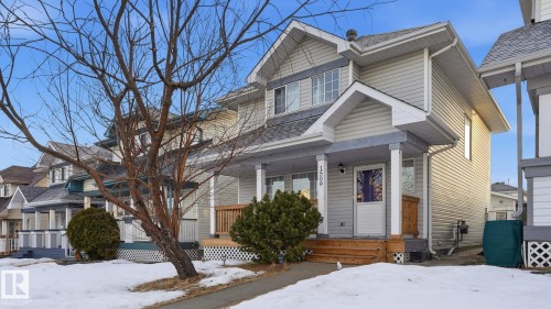 View of front of property featuring covered porch and roof with shingles - 1509 Jarvis Cr, Edmonton, AB - Outdoor With Facade