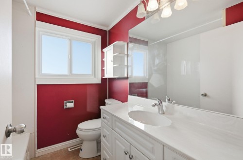 Bathroom with vanity and crown molding - 12916 95A Street, Edmonton, AB - Indoor Photo Showing Bathroom