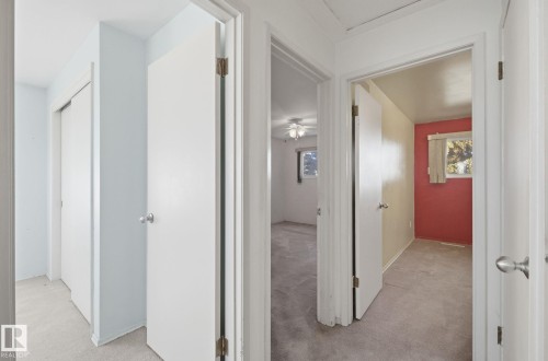 Hallway featuring light carpet - 12916 95A Street, Edmonton, AB - Indoor Photo Showing Other Room