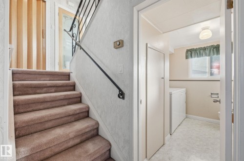 Stairway featuring baseboards - 12916 95A Street, Edmonton, AB - Indoor Photo Showing Other Room