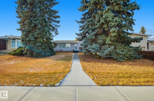 View of front of property with a front yard - 12916 95A Street, Edmonton, AB - Outdoor With Facade