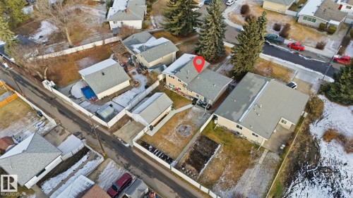 Snowy aerial view with a residential view - 12916 95A Street, Edmonton, AB - Outdoor With View