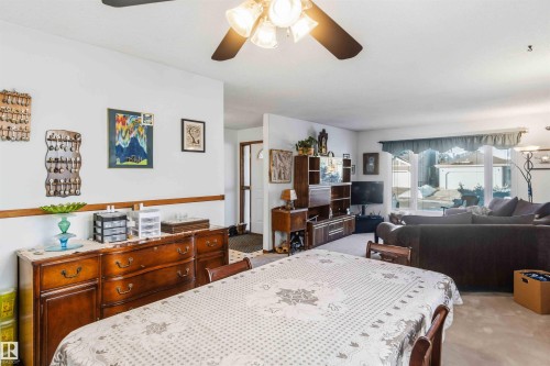 Dining space featuring carpet floors and a ceiling fan - 17619 94 Ave, Edmonton, AB - Indoor Photo Showing Bedroom