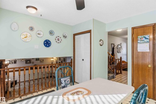 Dining room featuring stairs and a ceiling fan - 17619 94 Ave, Edmonton, AB - Indoor