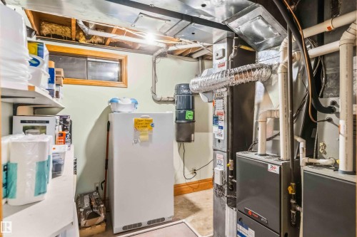 Utilities with a central vacuum unit and heating unit - 17619 94 Ave, Edmonton, AB - Indoor Photo Showing Basement